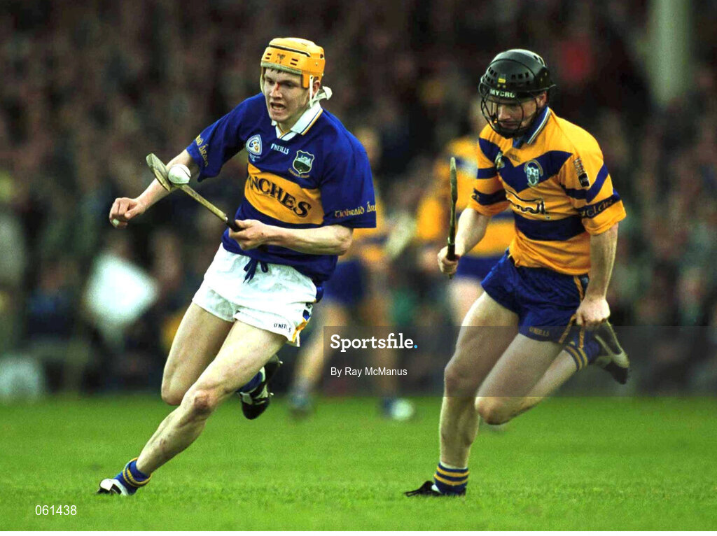 6 May 2001; Lar Corbett of Tipperary races clear from Frank Lohan of Clare during the Allianz National Hurling League Final between Tipperary and Clare at the Gaelic Grounds in Limerick. Photo by Ray McManus/Sportsfile