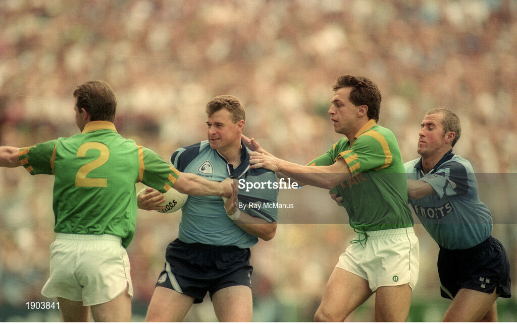 30 July 1995; Charlie Redmond, left, and Paul Clarke of Dublin in action against Brendan Reilly, right, and Robbie O'Malley of Meath during the Bank of Ireland Leinster Senior Football Championship Final match between Dublin and Meath at Croke Park in Dublin. Photo by Ray McManus/Sportsfile