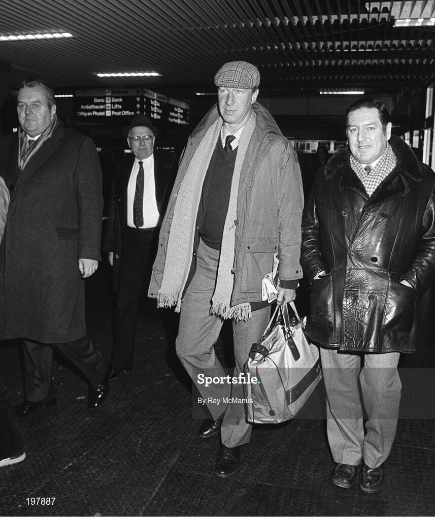 11 February 1986; Jack Charlton, accompanied by Des Casey, right, and Joe Delaney, assistant honorary treasurer of the FAI, arrives at Dublin airport four days after his appointment as Republic of Ireland manager. Dublin. Photo by Ray McManus/Sportsfile