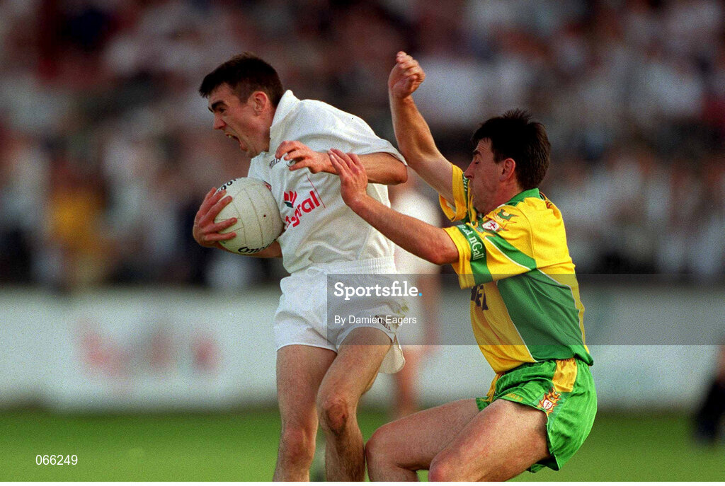 30 June 2001; John Doyle, Kildare, in action against Mark Crossan Donegal. Kildare v Donegal, Bank of Ireland All-Ireland Football Championship Qualifier, St. Conleth's Park, Newbridge, Co. Kildare. Photo by Damien Eagers/Sportsfile