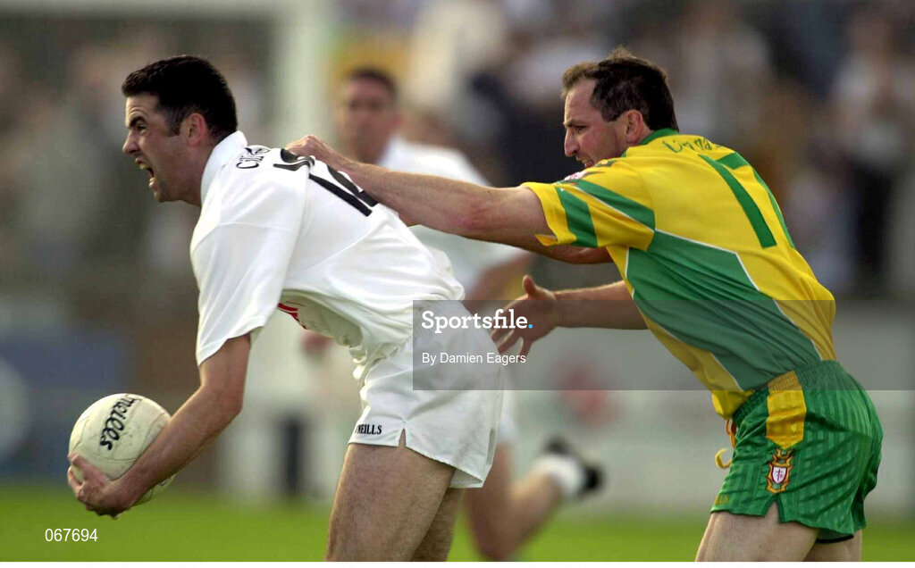 30 June 2001; Dermot Earley, Kildare, in action against Donegal's Noel McGinley. Kildare v Donegal, Bank of Ireland All-Ireland Championship Qualifier, St Conleths Park, Newbridge, Co. Kildare. Photo by Damien Eagers/Sportsfile