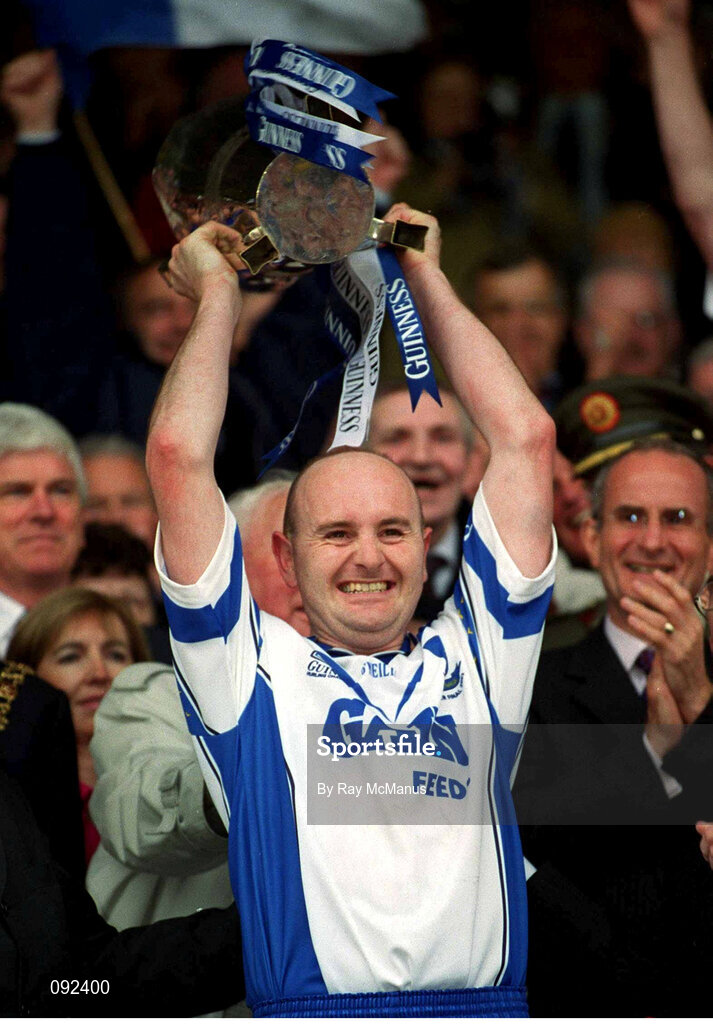 30 June 2002; Waterford captain Fergal Hartley lifts the cup after victory over Tipperary. Waterford v Tipperary, Guinness Munster Hurling Final, Pairc Ui Chaoimh, Cork. Photo by Ray McManus/Sportsfile