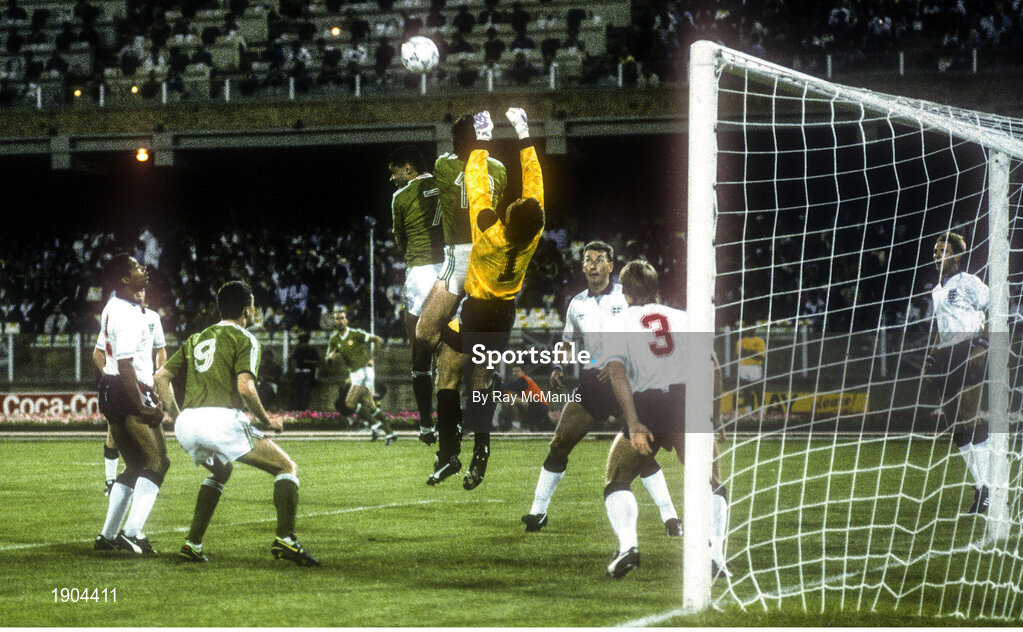 11 June 1990; England goalkeeper Peter Shilton clears under pressure from Paul McGrath and Niall Quinn of Republic of Ireland during the FIFA World Cup 1990 Group F match between England and Republic of Ireland at Stadio Sant'Elia in Cagliari, Italy. Photo by Ray McManus/Sportsfile