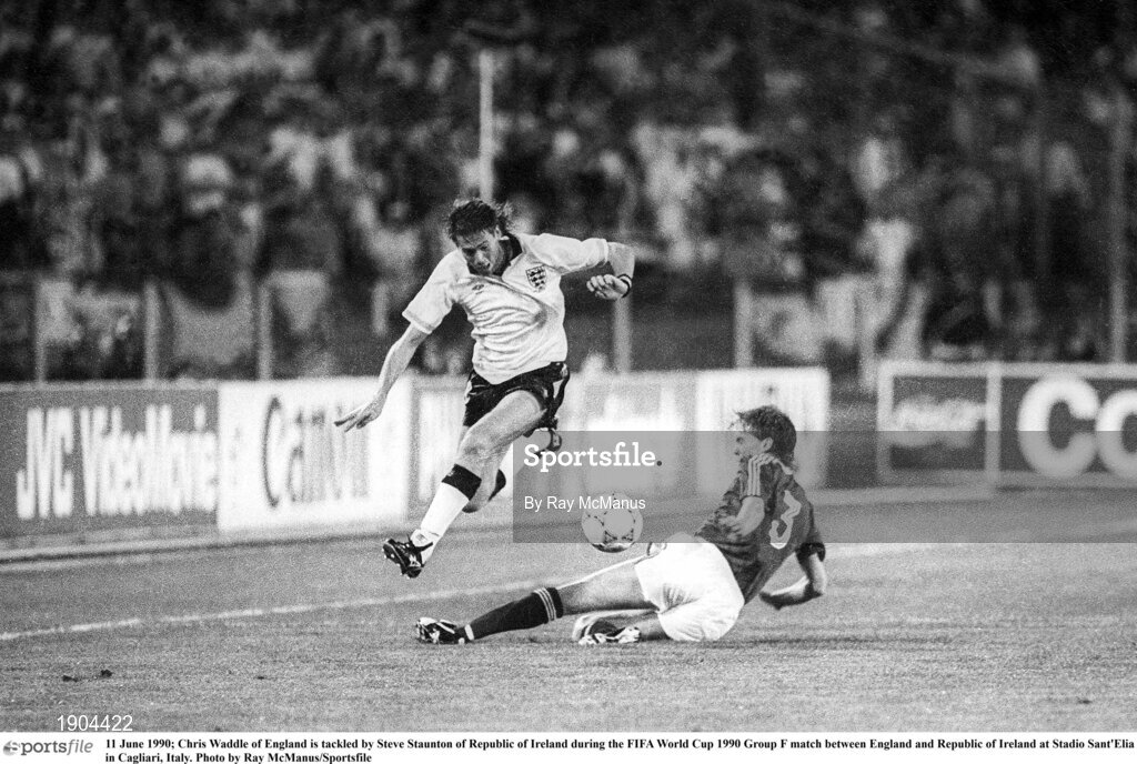 11 June 1990; Chris Waddle of England is tackled by Steve Staunton of Republic of Ireland during the FIFA World Cup 1990 Group F match between England and Republic of Ireland at Stadio Sant'Elia in Cagliari, Italy. Photo by Ray McManus/Sportsfile