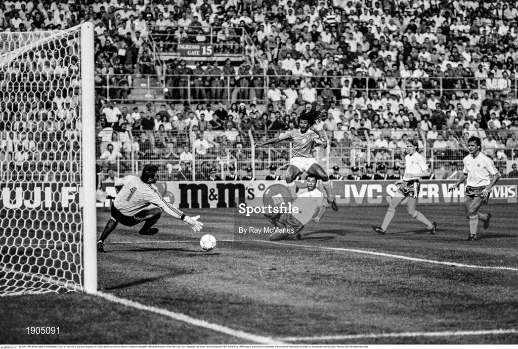 21 June 1990; Ruud Gullit of Netherlands scores his side's first goal past Republic of Ireland goalkeeper Packie Bonner watched by Republic of Ireland defenders Paul McGrath, Steve Staunton and Kevin Moran during the FIFA World Cup 1990 Group F match between Republic of Ireland and Netherlands at Stadio La Favorita in Palermo, Italy. Photo by Ray McManus/Sportsfile