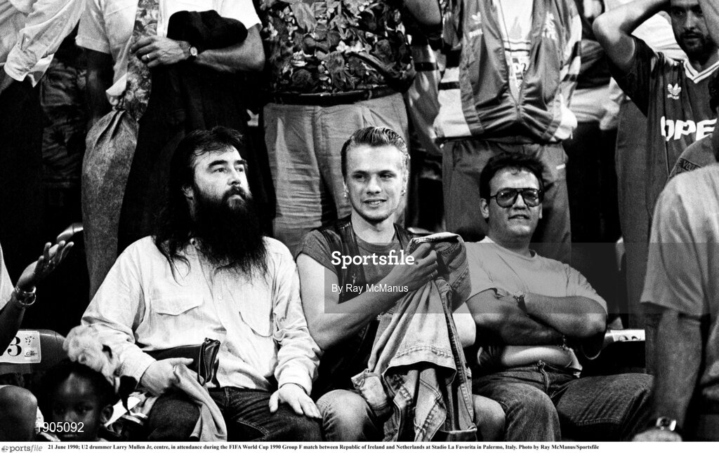 21 June 1990; U2 drummer Larry Mullen Jr, centre, in attendance during the FIFA World Cup 1990 Group F match between Republic of Ireland and Netherlands at Stadio La Favorita in Palermo, Italy. Photo by Ray McManus/Sportsfile