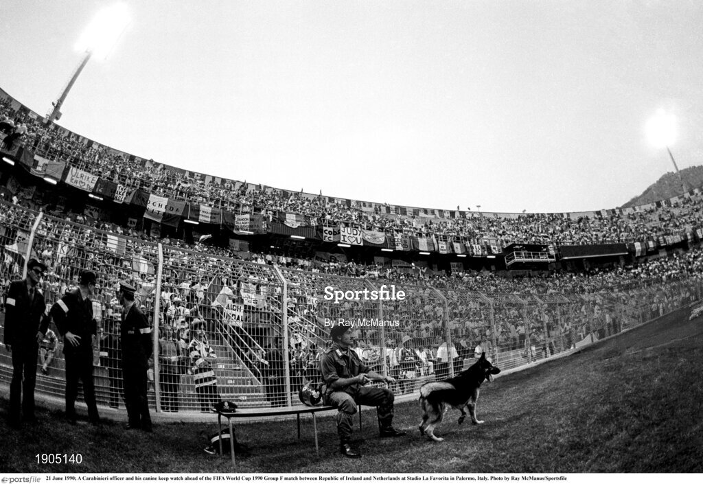 21 June 1990; A Carabinieri officer and his canine keep watch ahead of the FIFA World Cup 1990 Group F match between Republic of Ireland and Netherlands at Stadio La Favorita in Palermo, Italy. Photo by Ray McManus/Sportsfile