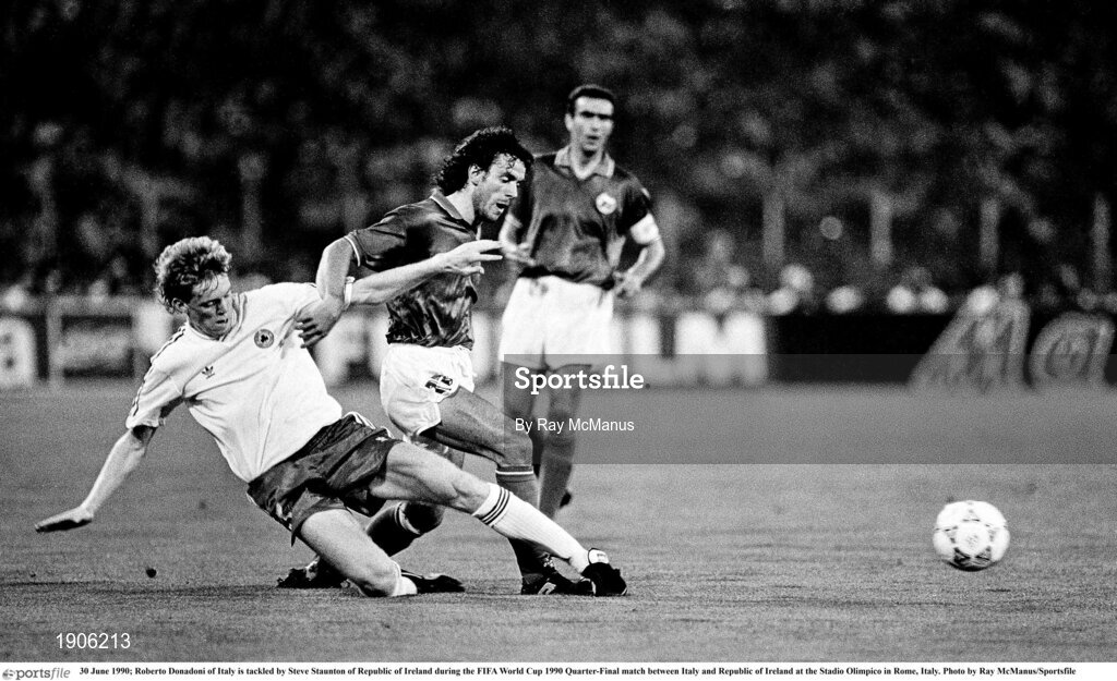 30 June 1990; Roberto Donadoni of Italy is tackled by Steve Staunton of Republic of Ireland during the FIFA World Cup 1990 Quarter-Final match between Italy and Republic of Ireland at the Stadio Olimpico in Rome, Italy. Photo by Ray McManus/Sportsfile