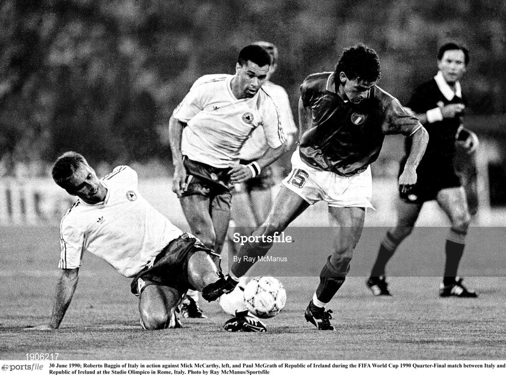 30 June 1990; Roberto Baggio of Italy in action against Mick McCarthy, left, and Paul McGrath of Republic of Ireland during the FIFA World Cup 1990 Quarter-Final match between Italy and Republic of Ireland at the Stadio Olimpico in Rome, Italy. Photo by Ray McManus/Sportsfile