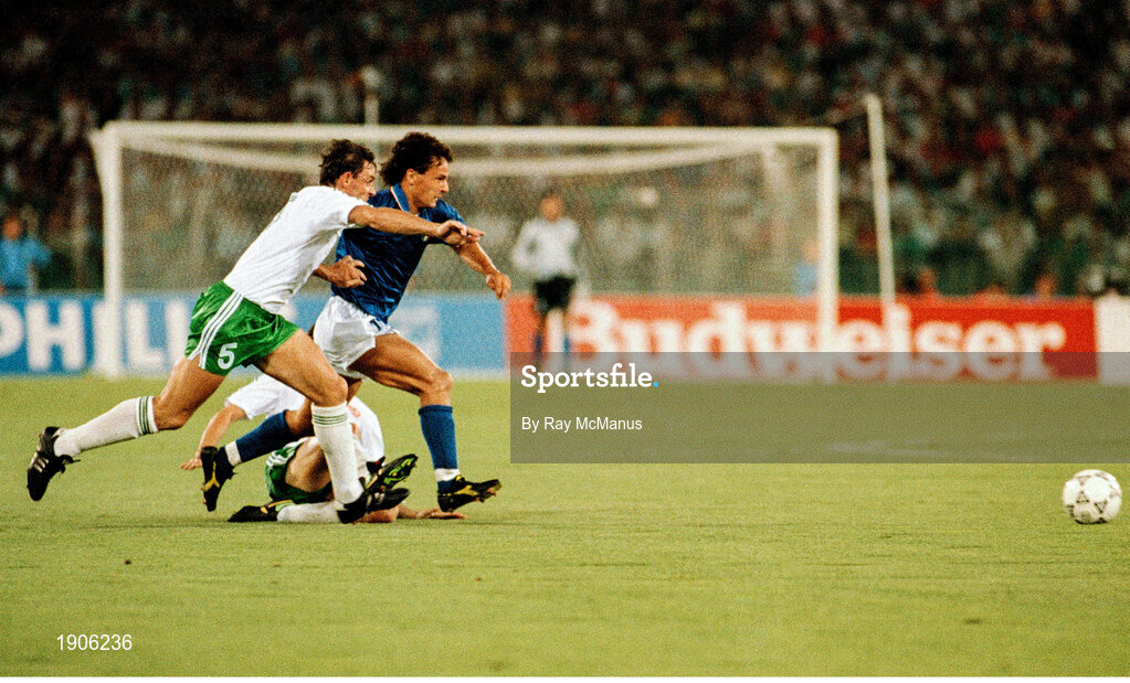 30 June 1990; Roberto Baggio of Italy in action against Kevin Moran of Republic of Ireland during the FIFA World Cup 1990 Quarter-Final match between Italy and Republic of Ireland at the Stadio Olimpico in Rome, Italy. Photo by Ray McManus/Sportsfile