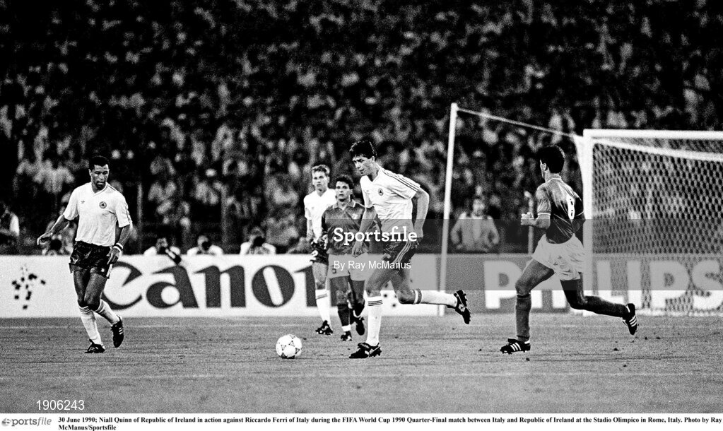 30 June 1990; Niall Quinn of Republic of Ireland in action against Riccardo Ferri of Italy during the FIFA World Cup 1990 Quarter-Final match between Italy and Republic of Ireland at the Stadio Olimpico in Rome, Italy. Photo by Ray McManus/Sportsfile