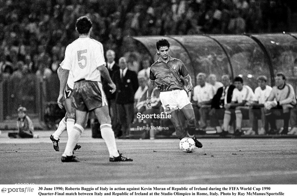 30 June 1990; Roberto Baggio of Italy in action against Kevin Moran of Republic of Ireland during the FIFA World Cup 1990 Quarter-Final match between Italy and Republic of Ireland at the Stadio Olimpico in Rome, Italy. Photo by Ray McManus/Sportsfile