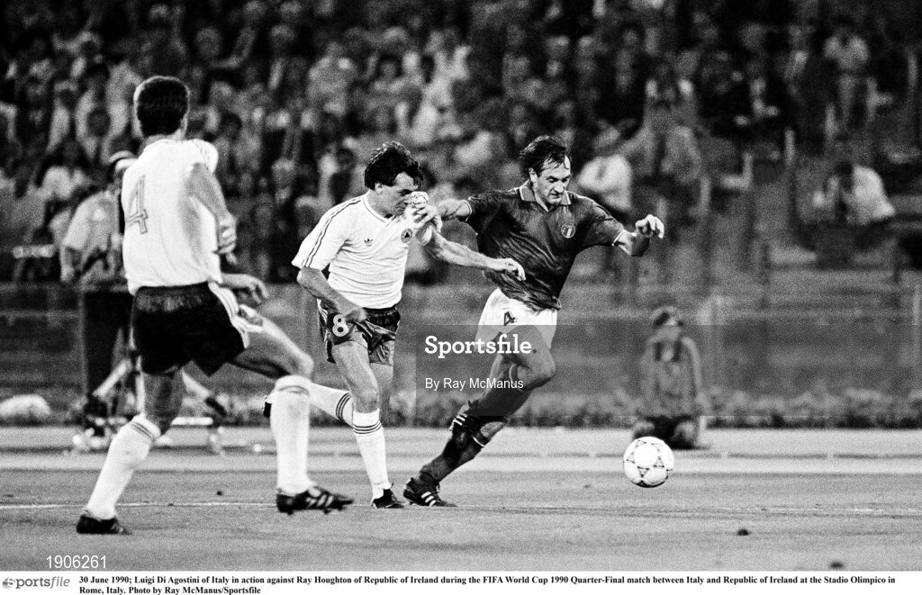 30 June 1990; Luigi Di Agostini of Italy in action against Ray Houghton of Republic of Ireland during the FIFA World Cup 1990 Quarter-Final match between Italy and Republic of Ireland at the Stadio Olimpico in Rome, Italy. Photo by Ray McManus/Sportsfile