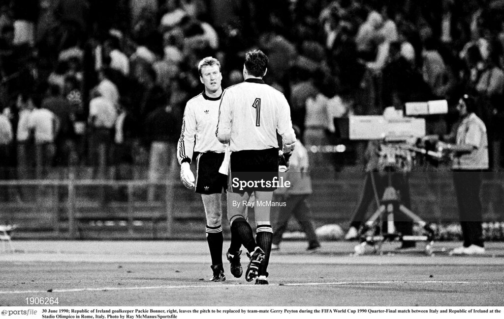 30 June 1990; Republic of Ireland goalkeeper Packie Bonner, right, leaves the pitch to be replaced by team-mate Gerry Peyton during the FIFA World Cup 1990 Quarter-Final match between Italy and Republic of Ireland at the Stadio Olimpico in Rome, Italy. Photo by Ray McManus/Sportsfile