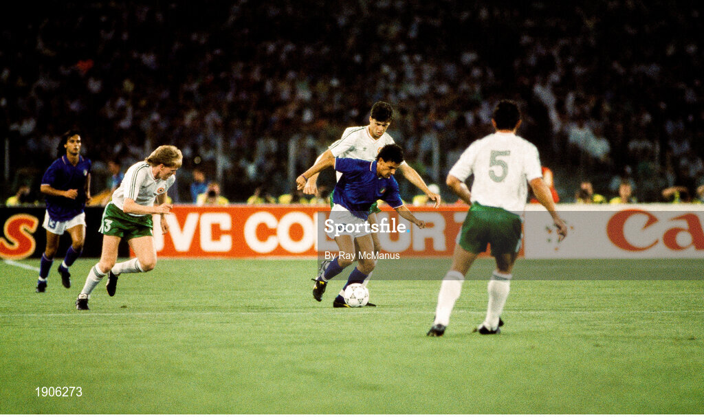 30 June 1990; Roberto Baggio of Italy in action against Niall Quinn of Republic of Ireland during the FIFA World Cup 1990 Quarter-Final match between Italy and Republic of Ireland at the Stadio Olimpico in Rome, Italy. Photo by Ray McManus/Sportsfile