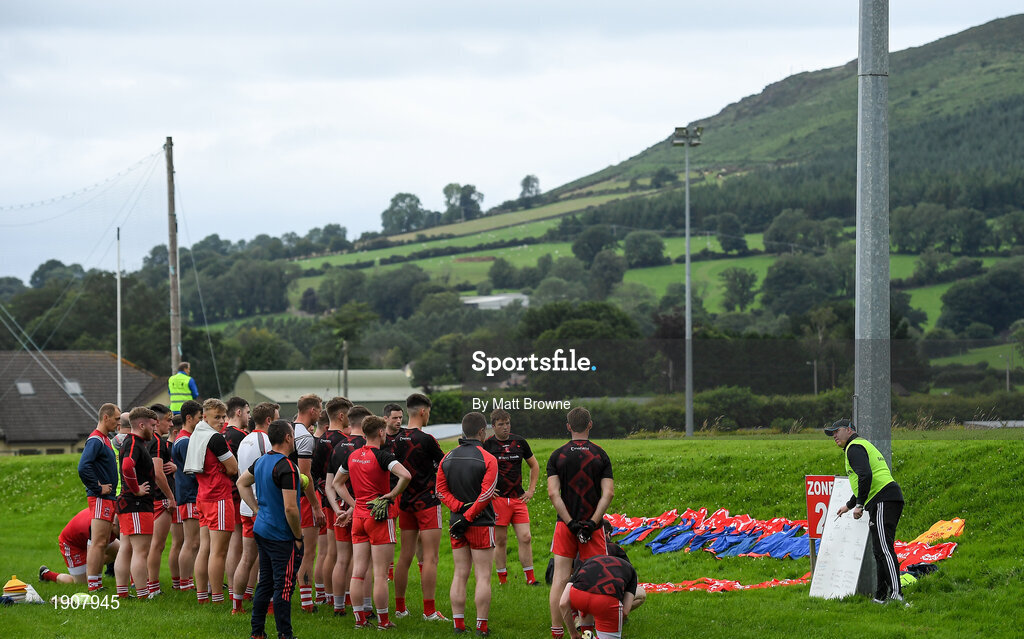 17 July 2020; Tinahely manager Alan Costello with his players before the start of the Wicklow County Senior Football Championship Round 1 match between Tinahely and Kiltegan at Baltinglass GAA Club in Baltinglass, Wicklow. Competitive GAA matches have been approved to return following the guidelines of Phase 3 of the Irish Government’s Roadmap for Reopening of Society and Business and protocols set down by the GAA governing authorities. With games having been suspended since March, competitive games can take place with updated protocols including a limit of 200 individuals at any one outdoor event, including players, officials and a limited number of spectators, with social distancing, hand sanitisation and face masks being worn by those in attendance among other measures in an effort to contain the spread of the Coronavirus (COVID-19) pandemic. Photo by Matt Browne/Sportsfile