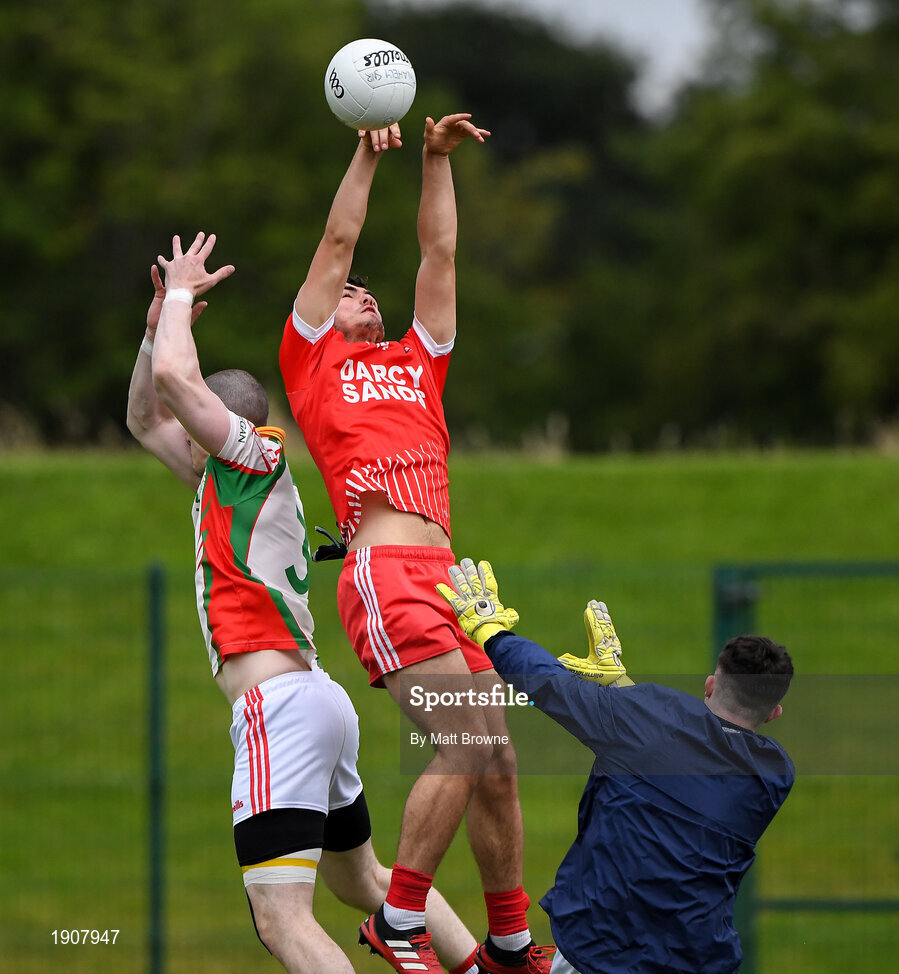 17 July 2020; Eoin D'Arcy of Tinahely on his way to scoring the first goal, past goalkeeper Dan Troy and defender Blaine Harmon of Kiltegan during the Wicklow County Senior Football Championship Round 1 match between Tinahely and Kiltegan at Baltinglass GAA Club in Baltinglass, Wicklow. Competitive GAA matches have been approved to return following the guidelines of Phase 3 of the Irish Government’s Roadmap for Reopening of Society and Business and protocols set down by the GAA governing authorities. With games having been suspended since March, competitive games can take place with updated protocols including a limit of 200 individuals at any one outdoor event, including players, officials and a limited number of spectators, with social distancing, hand sanitisation and face masks being worn by those in attendance among other measures in an effort to contain the spread of the Coronavirus (COVID-19) pandemic. Photo by Matt Browne/Sportsfile