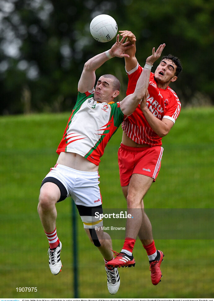 17 July 2020; Eoin D'Arcy of Tinahely in action against Blaine Harmon of Kiltegan during the Wicklow County Senior Football Championship Round 1 match between Tinahely and Kiltegan at Baltinglass GAA Club in Baltinglass, Wicklow. Competitive GAA matches have been approved to return following the guidelines of Phase 3 of the Irish Government’s Roadmap for Reopening of Society and Business and protocols set down by the GAA governing authorities. With games having been suspended since March, competitive games can take place with updated protocols including a limit of 200 individuals at any one outdoor event, including players, officials and a limited number of spectators, with social distancing, hand sanitisation and face masks being worn by those in attendance among other measures in an effort to contain the spread of the Coronavirus (COVID-19) pandemic. Photo by Matt Browne/Sportsfile