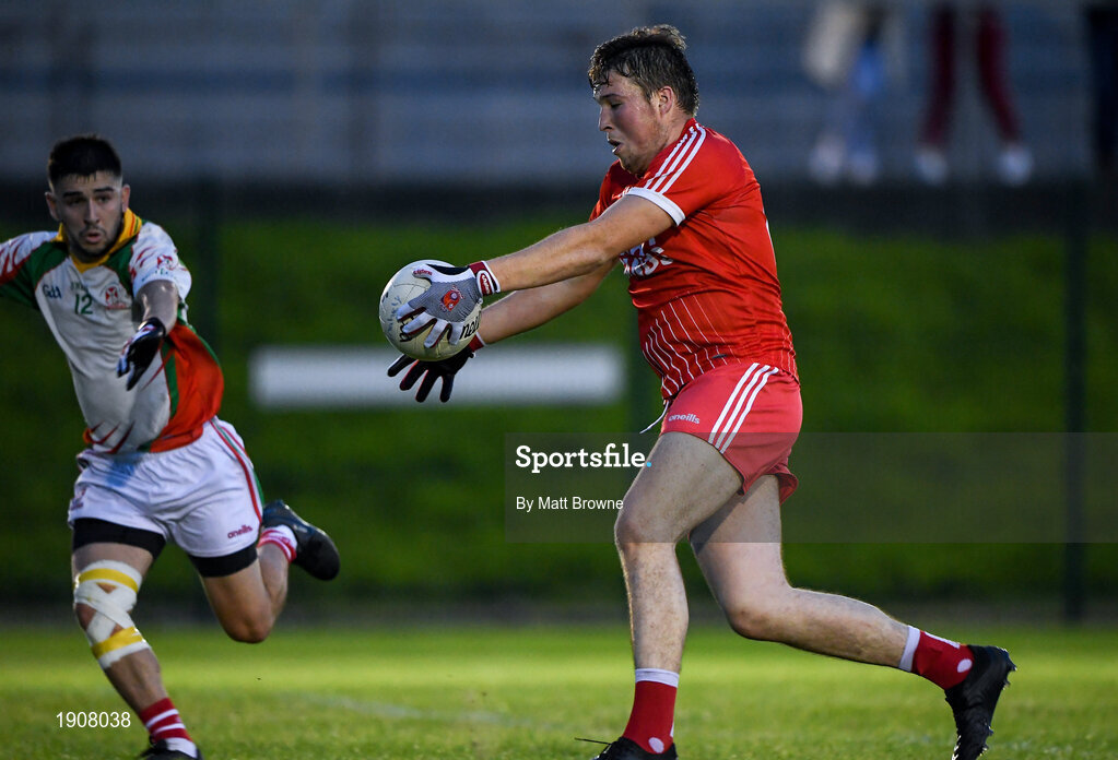 17 July 2020; Rory Stokes of Tinahely in action against Andy Foley of Kiltegan during the Wicklow County Senior Football Championship Round 1 match between Tinahely and Kiltegan at Baltinglass GAA Club in Baltinglass, Wicklow. Competitive GAA matches have been approved to return following the guidelines of Phase 3 of the Irish Government’s Roadmap for Reopening of Society and Business and protocols set down by the GAA governing authorities. With games having been suspended since March, competitive games can take place with updated protocols including a limit of 200 individuals at any one outdoor event, including players, officials and a limited number of spectators, with social distancing, hand sanitisation and face masks being worn by those in attendance among other measures in an effort to contain the spread of the Coronavirus (COVID-19) pandemic. Photo by Matt Browne/Sportsfile
