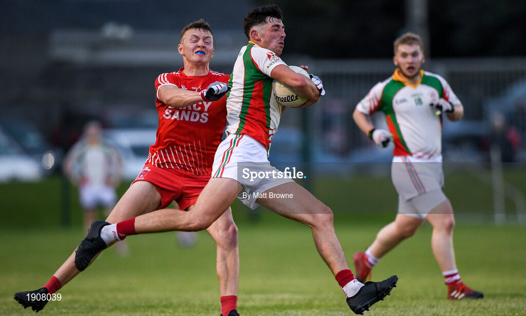 17 July 2020; Padraig O'Toole of Kiltegan in action against Eogham Byrne of Tinahely during the Wicklow County Senior Football Championship Round 1 match between Tinahely and Kiltegan at Baltinglass GAA Club in Baltinglass, Wicklow. Competitive GAA matches have been approved to return following the guidelines of Phase 3 of the Irish Government’s Roadmap for Reopening of Society and Business and protocols set down by the GAA governing authorities. With games having been suspended since March, competitive games can take place with updated protocols including a limit of 200 individuals at any one outdoor event, including players, officials and a limited number of spectators, with social distancing, hand sanitisation and face masks being worn by those in attendance among other measures in an effort to contain the spread of the Coronavirus (COVID-19) pandemic. Photo by Matt Browne/Sportsfile