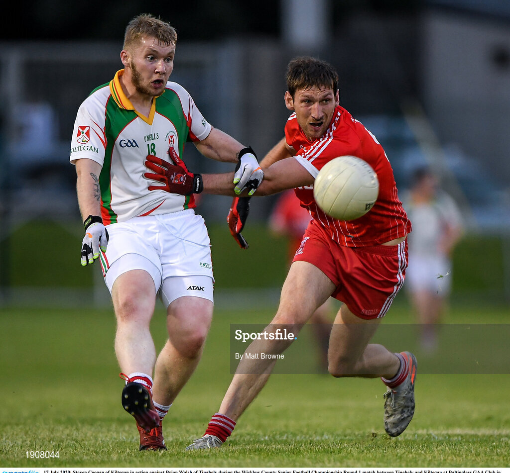 17 July 2020; Steven Coogan of Kiltegan in action against Brian Walsh of Tinahely during the Wicklow County Senior Football Championship Round 1 match between Tinahely and Kiltegan at Baltinglass GAA Club in Baltinglass, Wicklow. Competitive GAA matches have been approved to return following the guidelines of Phase 3 of the Irish Government’s Roadmap for Reopening of Society and Business and protocols set down by the GAA governing authorities. With games having been suspended since March, competitive games can take place with updated protocols including a limit of 200 individuals at any one outdoor event, including players, officials and a limited number of spectators, with social distancing, hand sanitisation and face masks being worn by those in attendance among other measures in an effort to contain the spread of the Coronavirus (COVID-19) pandemic. Photo by Matt Browne/Sportsfile