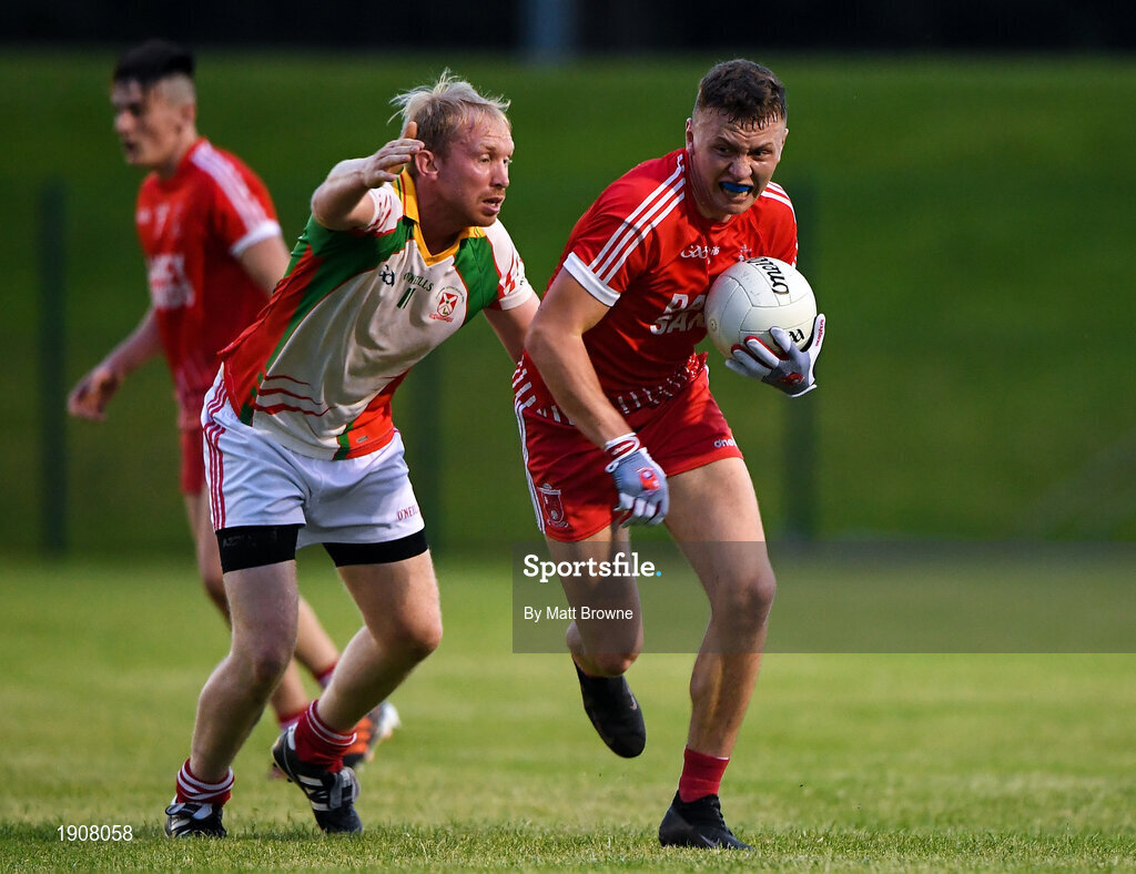 17 July 2020; Eoghan Byrne of Tinahely in action against Bryan Cullen of Kiltegan during the Wicklow County Senior Football Championship Round 1 match between Tinahely and Kiltegan at Baltinglass GAA Club in Baltinglass, Wicklow. Competitive GAA matches have been approved to return following the guidelines of Phase 3 of the Irish Government’s Roadmap for Reopening of Society and Business and protocols set down by the GAA governing authorities. With games having been suspended since March, competitive games can take place with updated protocols including a limit of 200 individuals at any one outdoor event, including players, officials and a limited number of spectators, with social distancing, hand sanitisation and face masks being worn by those in attendance among other measures in an effort to contain the spread of the Coronavirus (COVID-19) pandemic. Photo by Matt Browne/Sportsfile