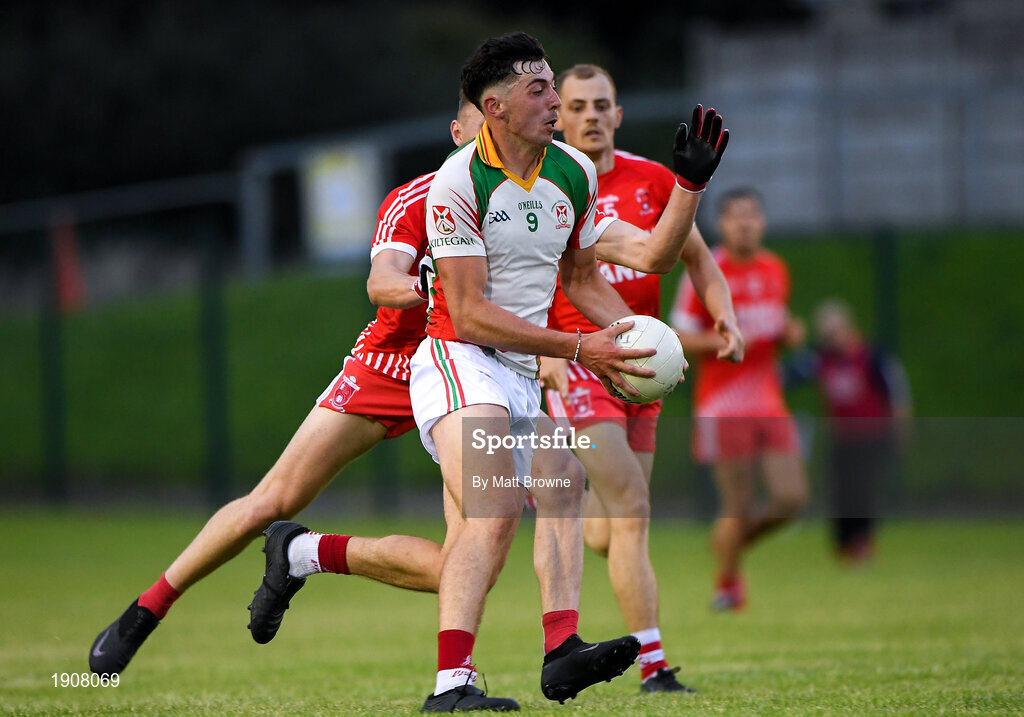 17 July 2020; Padraig O'Toole of Kiltegan in action against Eogham Byrne of Tinahely during the Wicklow County Senior Football Championship Round 1 match between Tinahely and Kiltegan at Baltinglass GAA Club in Baltinglass, Wicklow. Competitive GAA matches have been approved to return following the guidelines of Phase 3 of the Irish Government’s Roadmap for Reopening of Society and Business and protocols set down by the GAA governing authorities. With games having been suspended since March, competitive games can take place with updated protocols including a limit of 200 individuals at any one outdoor event, including players, officials and a limited number of spectators, with social distancing, hand sanitisation and face masks being worn by those in attendance among other measures in an effort to contain the spread of the Coronavirus (COVID-19) pandemic. Photo by Matt Browne/Sportsfile