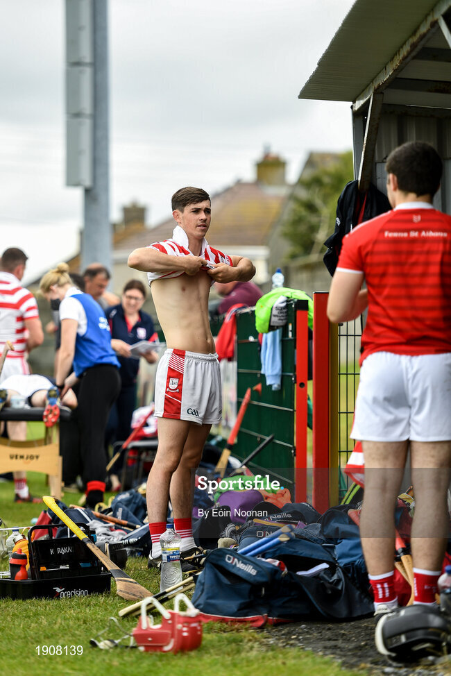 18 July 2020; Rory Scallan of Ferns St Aidans prepares himself in the dug-out ahead of the Wexford County Senior Hurling Championship Group B Round 1 match between Ferns St Aidan's and Faythe Harriers at Bellefield in Enniscorthy, Wexford. Competitive GAA matches have been approved to return following the guidelines of Phase 3 of the Irish Government’s Roadmap for Reopening of Society and Business and protocols set down by the GAA governing authorities. With games having been suspended since March, competitive games can take place with updated protocols including a limit of 200 individuals at any one outdoor event, including players, officials and a limited number of spectators, with social distancing, hand sanitisation and face masks being worn by those in attendance among other measures in an effort to contain the spread of the Coronavirus (COVID-19) pandemic. Photo by Eóin Noonan/Sportsfile