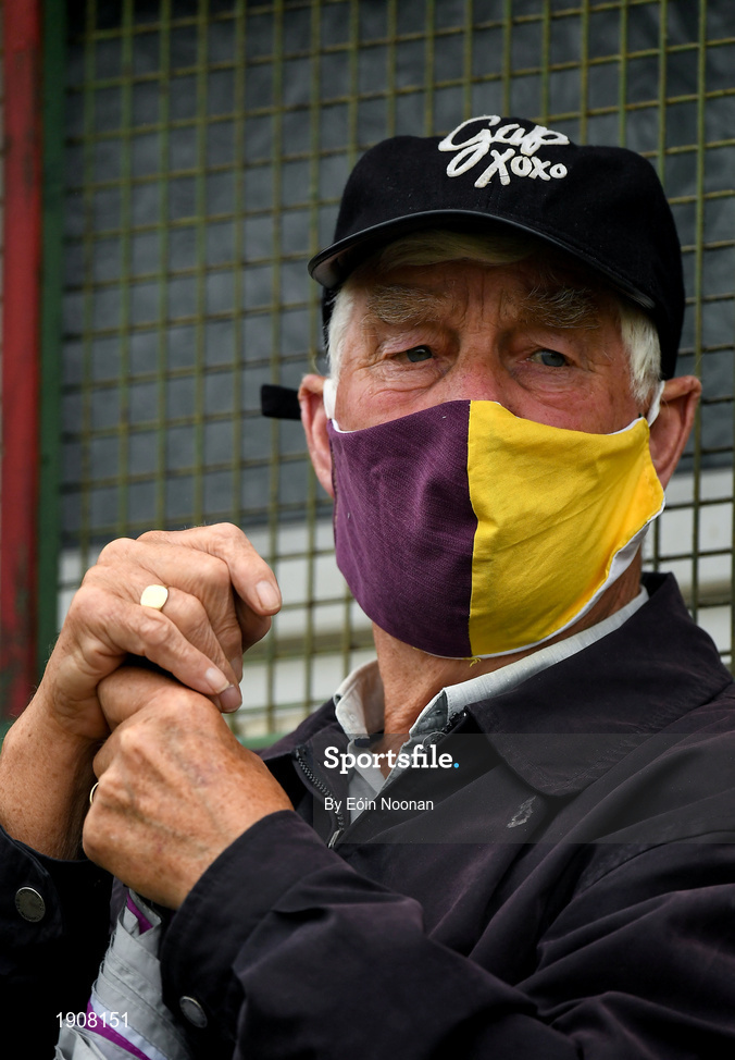 18 July 2020; A supporter, wearing a face mask, watches on from the stand during the Wexford County Senior Hurling Championship Group B Round 1 match between Ferns St Aidan's and Faythe Harriers at Bellefield in Enniscorthy, Wexford. Competitive GAA matches have been approved to return following the guidelines of Phase 3 of the Irish Government’s Roadmap for Reopening of Society and Business and protocols set down by the GAA governing authorities. With games having been suspended since March, competitive games can take place with updated protocols including a limit of 200 individuals at any one outdoor event, including players, officials and a limited number of spectators, with social distancing, hand sanitisation and face masks being worn by those in attendance among other measures in an effort to contain the spread of the Coronavirus (COVID-19) pandemic. Photo by Eóin Noonan/Sportsfile