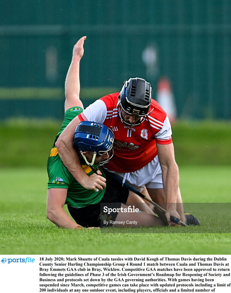 18 July 2020; Mark Shuutte of Cuala tussles with David Keogh of Thomas Davis during the Dublin County Senior Hurling Championship Group 4 Round 1 match between Cuala and Thomas Davis at Bray Emmets GAA club in Bray, Wicklow. Competitive GAA matches have been approved to return following the guidelines of Phase 3 of the Irish Government’s Roadmap for Reopening of Society and Business and protocols set down by the GAA governing authorities. With games having been suspended since March, competitive games can take place with updated protocols including a limit of 200 individuals at any one outdoor event, including players, officials and a limited number of spectators, with social distancing, hand sanitisation and face masks being worn by those in attendance among other measures in an effort to contain the spread of the Coronavirus (COVID-19) pandemic. Photo by Ramsey Cardy/Sportsfile