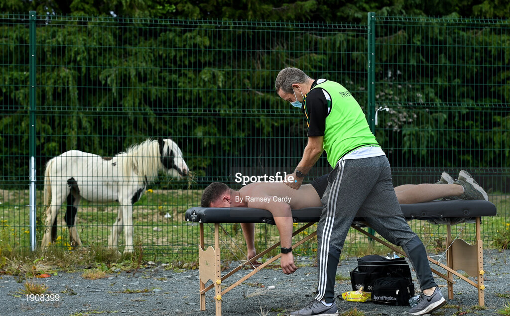 18 July 2020; David Keogh of Thomas Davis receives treatment from team physio Carl O'Toole ahead of the Dublin County Senior Hurling Championship Group 4 Round 1 match between Cuala and Thomas Davis at Bray Emmets GAA club in Bray, Wicklow. Competitive GAA matches have been approved to return following the guidelines of Phase 3 of the Irish Government’s Roadmap for Reopening of Society and Business and protocols set down by the GAA governing authorities. With games having been suspended since March, competitive games can take place with updated protocols including a limit of 200 individuals at any one outdoor event, including players, officials and a limited number of spectators, with social distancing, hand sanitisation and face masks being worn by those in attendance among other measures in an effort to contain the spread of the Coronavirus (COVID-19) pandemic. Photo by Ramsey Cardy/Sportsfile