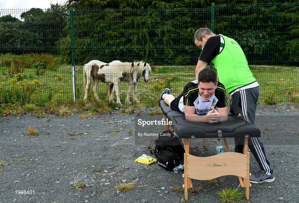 18 July 2020; John O'Riordan of Thomas Davis receives treatment from team physio Carl O'Toole ahead of the Dublin County Senior Hurling Championship Group 4 Round 1 match between Cuala and Thomas Davis at Bray Emmets GAA club in Bray, Wicklow. Competitive GAA matches have been approved to return following the guidelines of Phase 3 of the Irish Government’s Roadmap for Reopening of Society and Business and protocols set down by the GAA governing authorities. With games having been suspended since March, competitive games can take place with updated protocols including a limit of 200 individuals at any one outdoor event, including players, officials and a limited number of spectators, with social distancing, hand sanitisation and face masks being worn by those in attendance among other measures in an effort to contain the spread of the Coronavirus (COVID-19) pandemic. Photo by Ramsey Cardy/Sportsfile