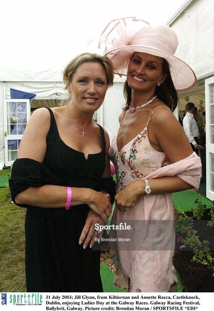 31 July 2003; Jill Glynn, from Kiltiernan and Annette Rocca, Castleknock, Dublin, enjoying Ladies Day at the Galway Races. Galway Racing Festival, Ballybrit, Galway. Picture credit; Brendan Moran / SPORTSFILE *EDI*