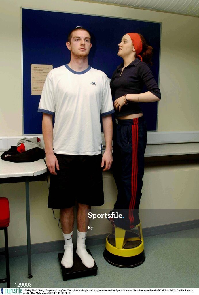 27 May 2002; Barry Ferguson, Longford Town, has his height and weight measured by Sports Scientist & Health student Siomha N’ Nidh at DCU, Dublin. Picture credit; Ray McManus / SPORTSFILE *EDI*