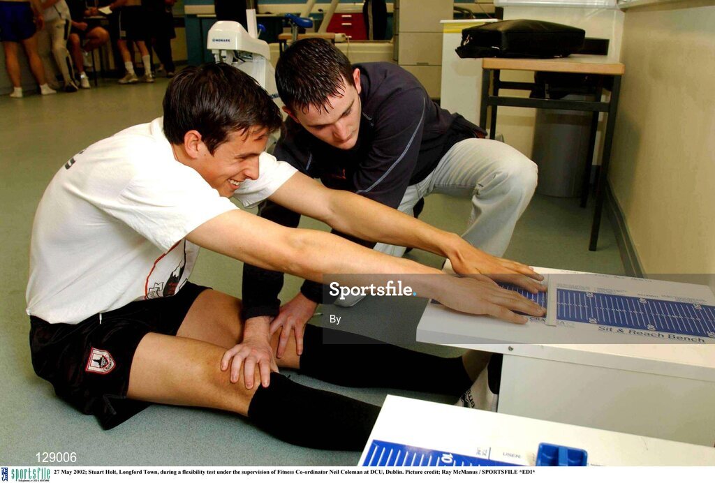 27 May 2002; Stuart Holt, Longford Town, during a flexibility test under the supervision of Fitness Co-ordinator Neil Coleman at DCU, Dublin. Picture credit; Ray McManus / SPORTSFILE *EDI*