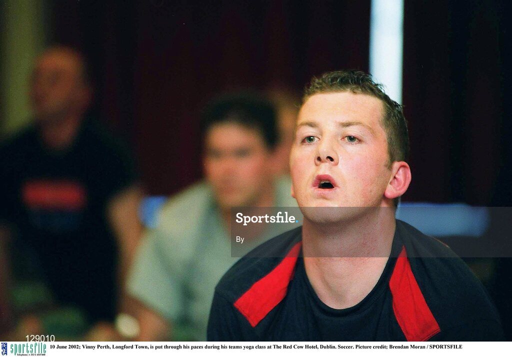 10 June 2002; Vinny Perth, Longford Town, is put through his paces during his teams yoga class at The Red Cow Hotel, Dublin. Soccer. Picture credit; Brendan Moran / SPORTSFILE