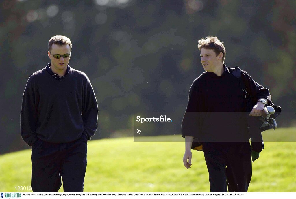 26 June 2002; Irish SUN's Brian Keogh, right, walks along the 3rd fairway with Michael Hoey. Murphy's Irish Open Pro Am, Fota Island Golf Club, Cobh, Co. Cork. Picture credit; Damien Eagers / SPORTSFILE *EDI*