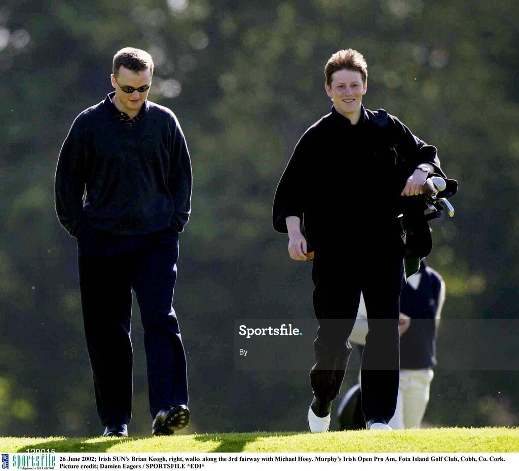 26 June 2002; Irish SUN's Brian Keogh, right, walks along the 3rd fairway with Michael Hoey. Murphy's Irish Open Pro Am, Fota Island Golf Club, Cobh, Co. Cork. Picture credit; Damien Eagers / SPORTSFILE *EDI*