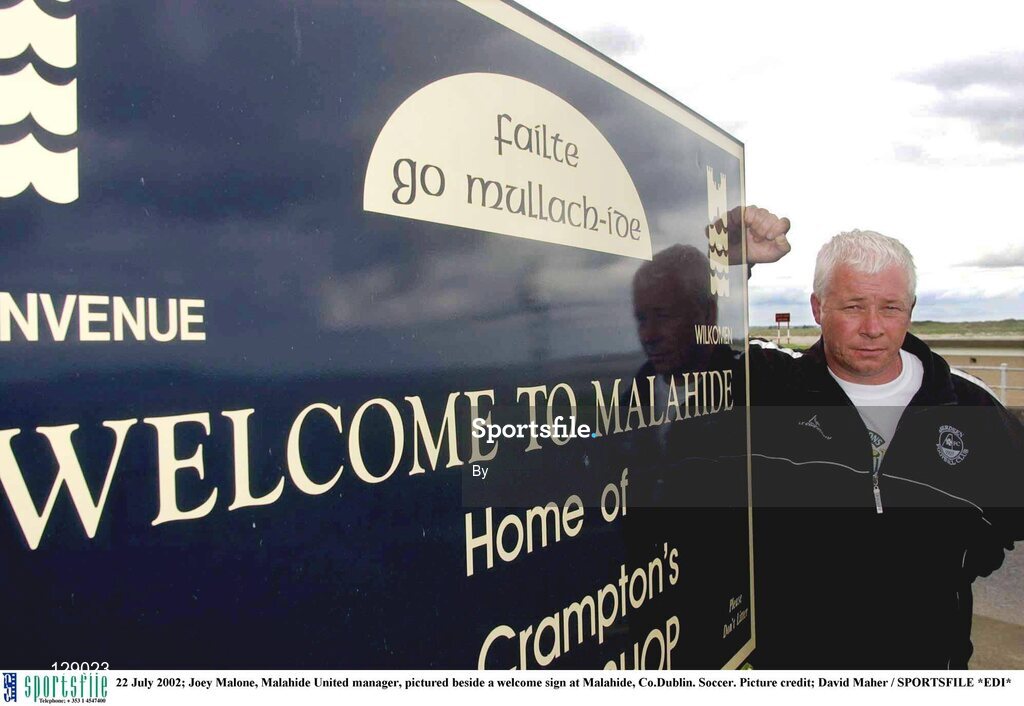 22 July 2002; Joey Malone, Malahide United manager, pictured beside a welcome sign at Malahide, Co.Dublin. Soccer. Picture credit; David Maher / SPORTSFILE *EDI*