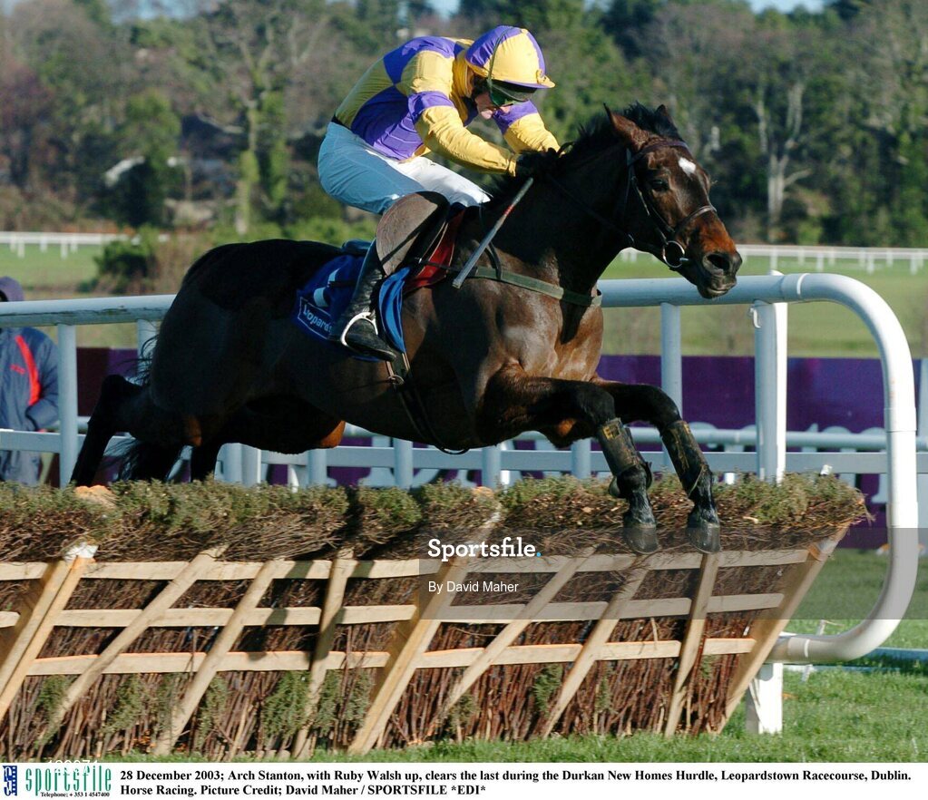 28 December 2003; Arch Stanton, with Ruby Walsh up, clears the last during the Durkan New Homes Hurdle, Leopardstown Racecourse, Dublin. Horse Racing. Picture Credit; David Maher / SPORTSFILE *EDI*