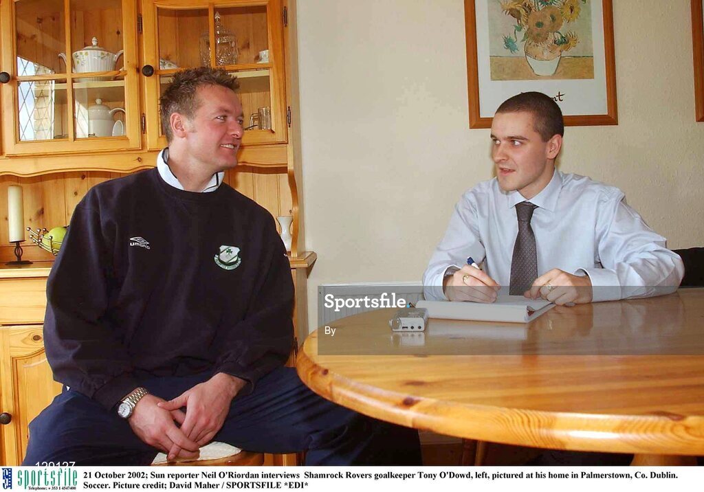 21 October 2002; Sun reporter Neil O'Riordan interviews  Shamrock Rovers goalkeeper Tony O'Dowd, left, pictured at his home in Palmerstown, Co. Dublin. Soccer. Picture credit; David Maher / SPORTSFILE *EDI*