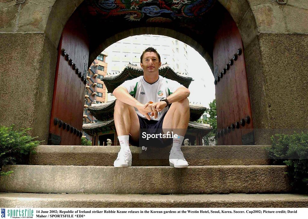14 June 2002; Republic of Ireland striker Robbie Keane relaxes in the Korean gardens at the Westin Hotel, Seoul, Korea. Soccer. Cup2002; Picture credit; David Maher / SPORTSFILE *EDI*
