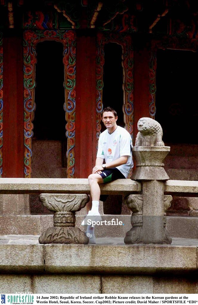 14 June 2002; Republic of Ireland striker Robbie Keane relaxes in the Korean gardens at the Westin Hotel, Seoul, Korea. Soccer. Cup2002; Picture credit; David Maher / SPORTSFILE *EDI*