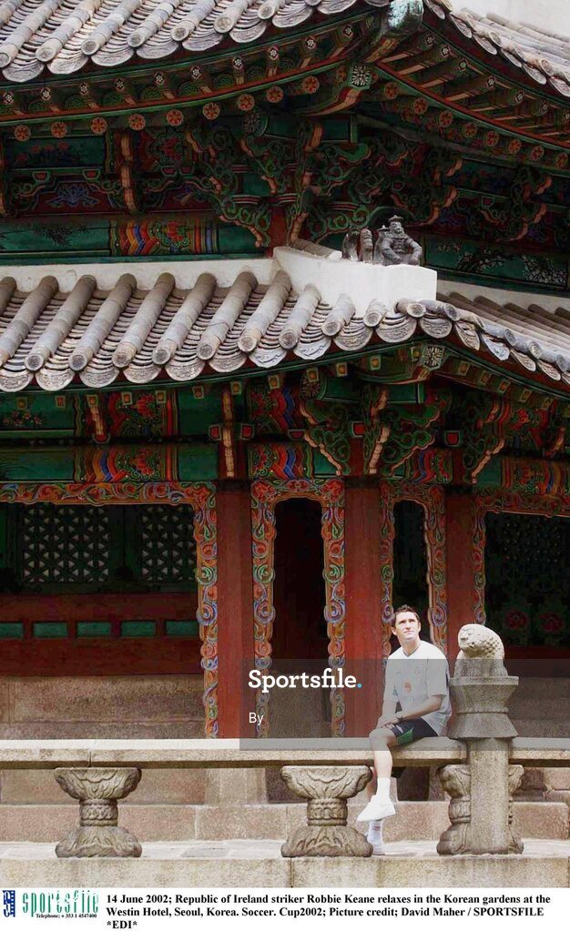 14 June 2002; Republic of Ireland striker Robbie Keane relaxes in the Korean gardens at the Westin Hotel, Seoul, Korea. Soccer. Cup2002; Picture credit; David Maher / SPORTSFILE *EDI*