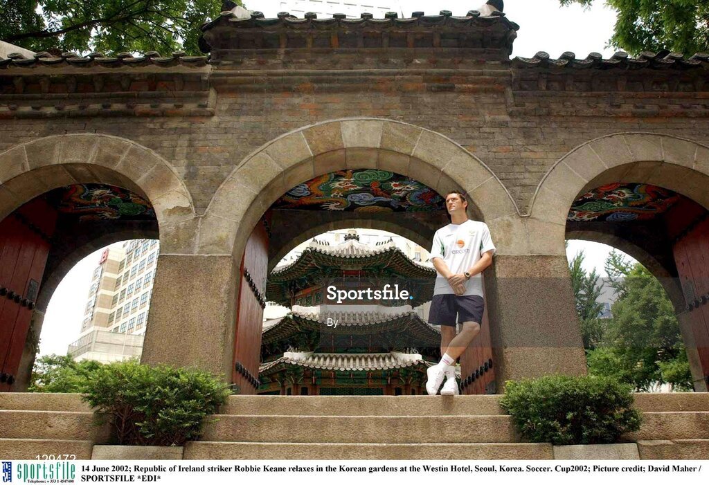 14 June 2002; Republic of Ireland striker Robbie Keane relaxes in the Korean gardens at the Westin Hotel, Seoul, Korea. Soccer. Cup2002; Picture credit; David Maher / SPORTSFILE *EDI*