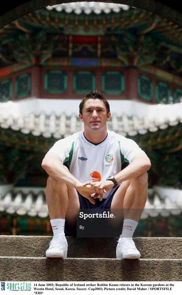 14 June 2002; Republic of Ireland striker Robbie Keane relaxes in the Korean gardens at the Westin Hotel, Seoul, Korea. Soccer. Cup2002; Picture credit; David Maher / SPORTSFILE *EDI*