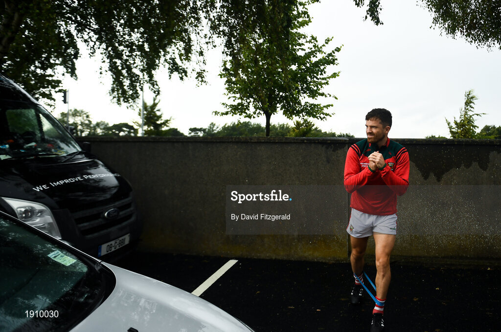 25 July 2020; Chris Barrett of Clontarf stretches in the car park prior to the Dublin County Senior Football Championship Round 1 match between Ballyboden St Endas and Clontarf at Pairc Uí Mhurchu in Dublin. GAA matches continue to take place in front of a limited number of people in an effort to contain the spread of the Coronavirus (COVID-19) pandemic. Photo by David Fitzgerald/Sportsfile