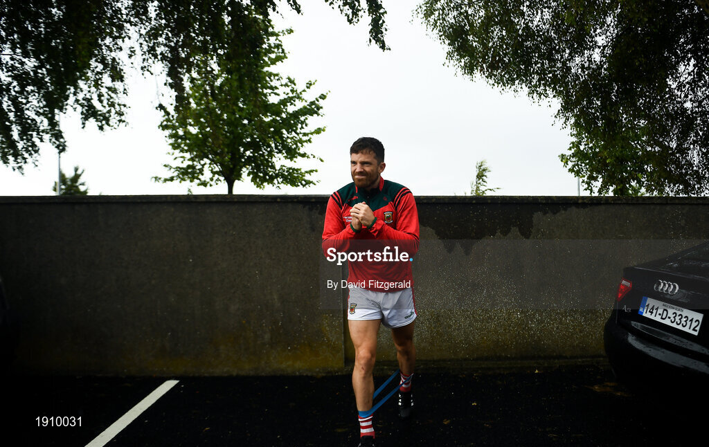25 July 2020; Chris Barrett of Clontarf stretches in the car park prior to the Dublin County Senior Football Championship Round 1 match between Ballyboden St Endas and Clontarf at Pairc Uí Mhurchu in Dublin. GAA matches continue to take place in front of a limited number of people in an effort to contain the spread of the Coronavirus (COVID-19) pandemic. Photo by David Fitzgerald/Sportsfile
