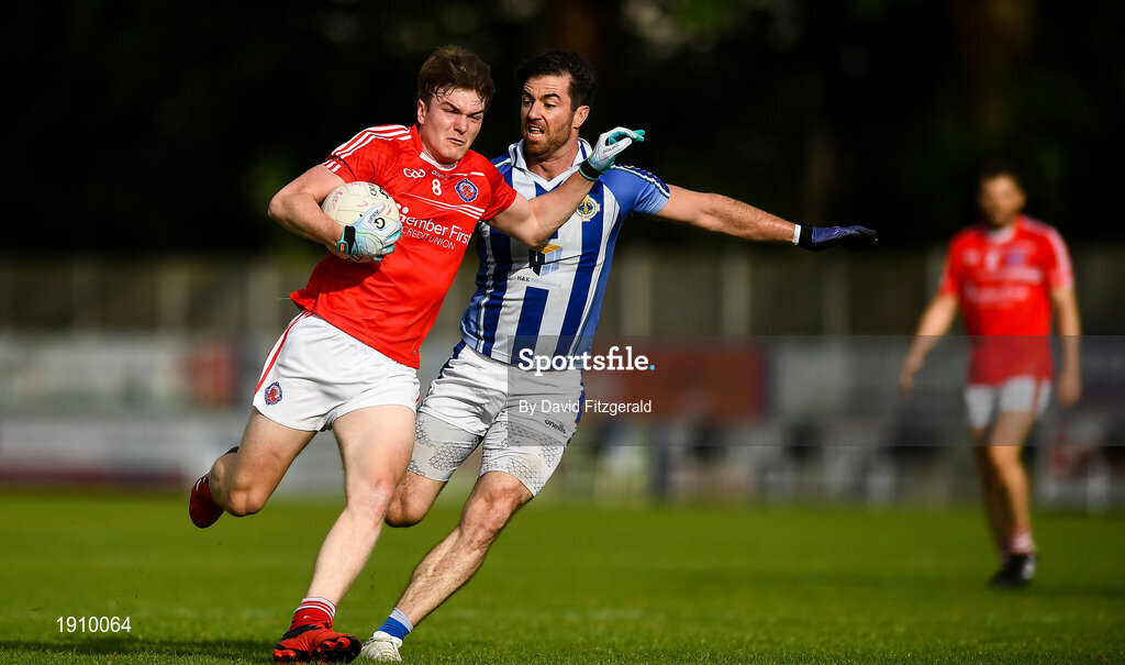 25 July 2020; Nathan Doran of Clontarf in action against Michael Darragh Macauley of Ballyboden St Enda's during the Dublin County Senior Football Championship Round 1 match between Ballyboden St Endas and Clontarf at Pairc Uí Mhurchu in Dublin. GAA matches continue to take place in front of a limited number of people in an effort to contain the spread of the Coronavirus (COVID-19) pandemic. Photo by David Fitzgerald/Sportsfile