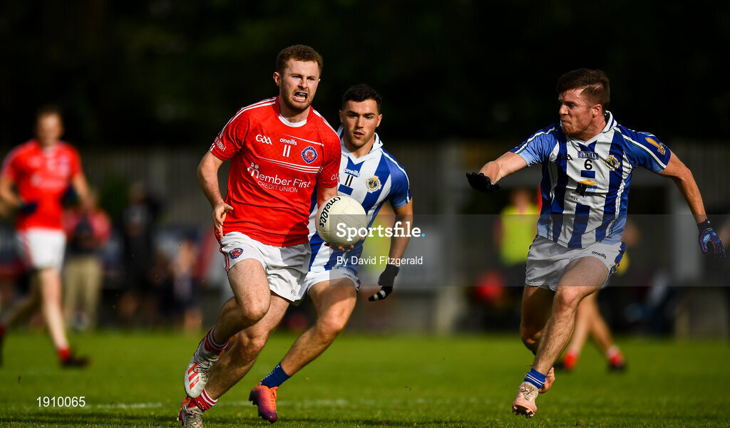 25 July 2020; Jack McCaffrey of Clontarf in action against Colm Basquel, centre, and Robbie McDaid of Ballyboden St Enda's during the Dublin County Senior Football Championship Round 1 match between Ballyboden St Endas and Clontarf at Pairc Uí Mhurchu in Dublin. GAA matches continue to take place in front of a limited number of people in an effort to contain the spread of the Coronavirus (COVID-19) pandemic. Photo by David Fitzgerald/Sportsfile